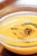 Cream Of Pumpkin And White Beans With Coriander Flavoured Olive Oil And Sliced Flaky Spinach Roll